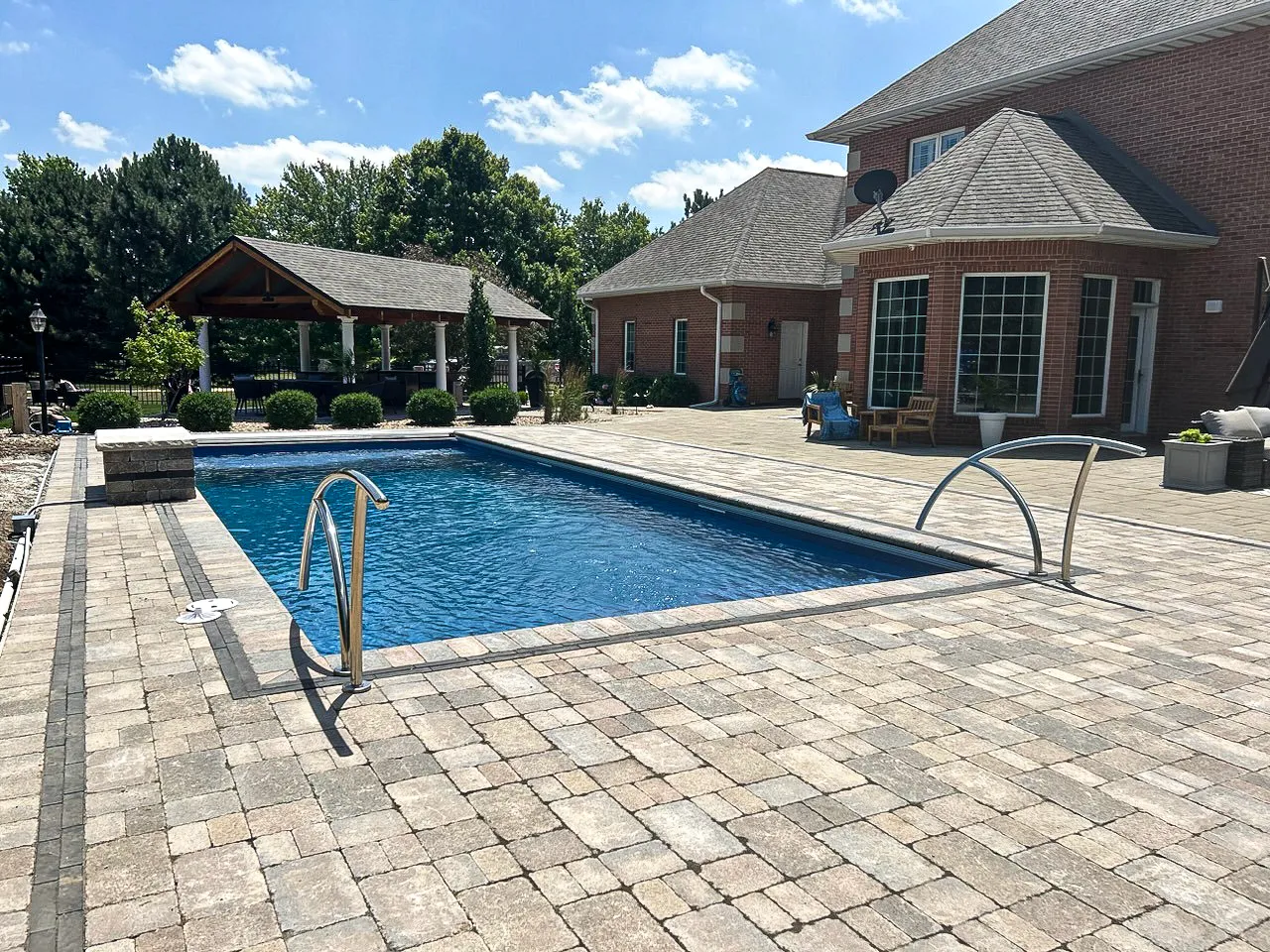 pool contractor project near Champaign County brick patio integration