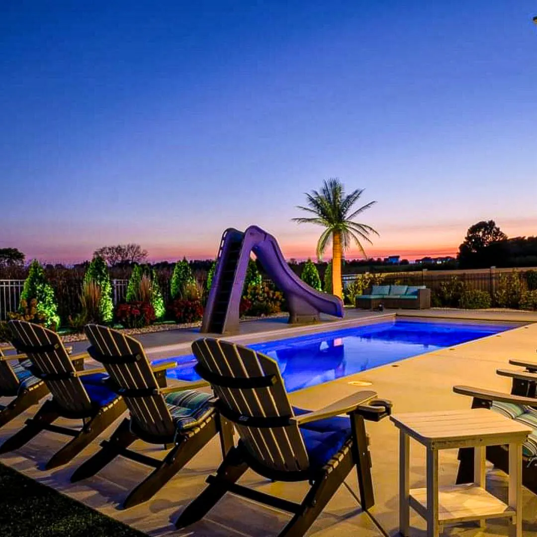 custom backyard pool project near Monticello IL at sunset