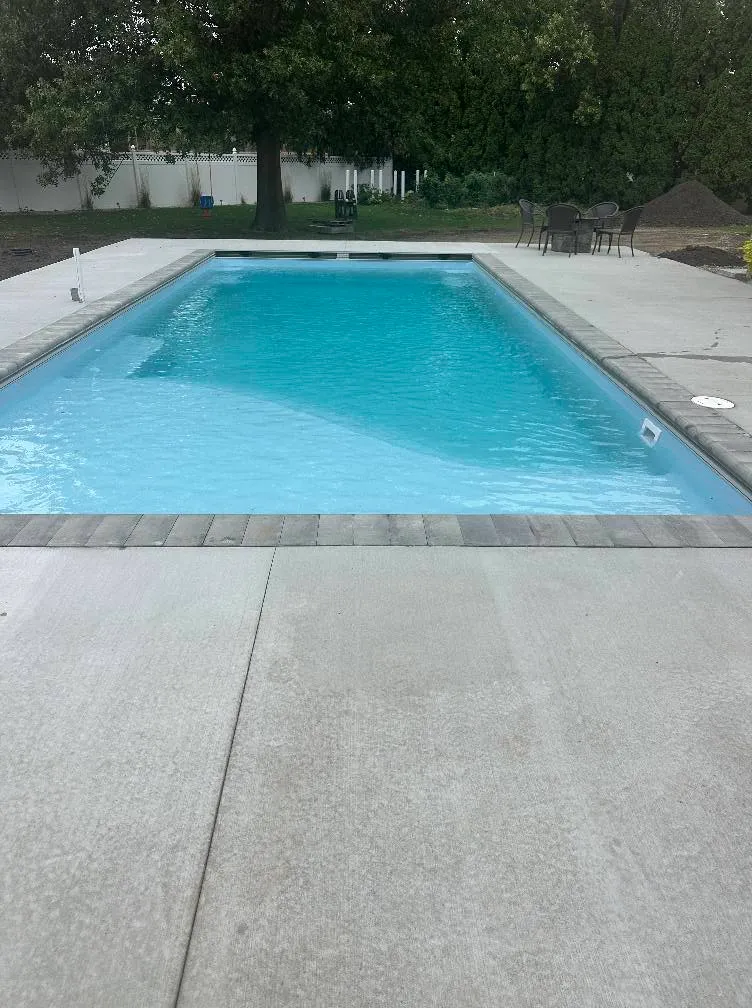 custom fiberglass pool installation in Urbana IL with modern lines