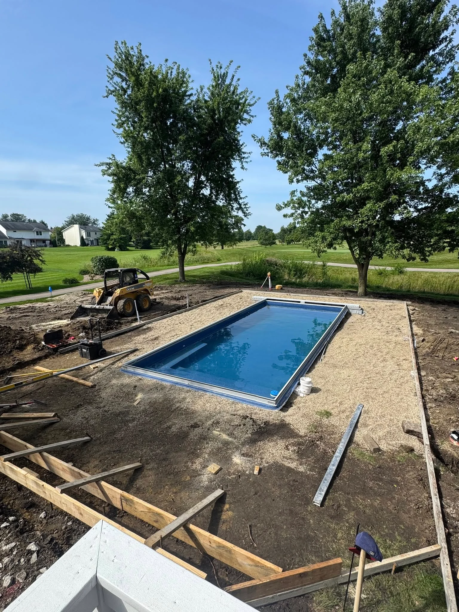 Concrete forms set around the pool shell